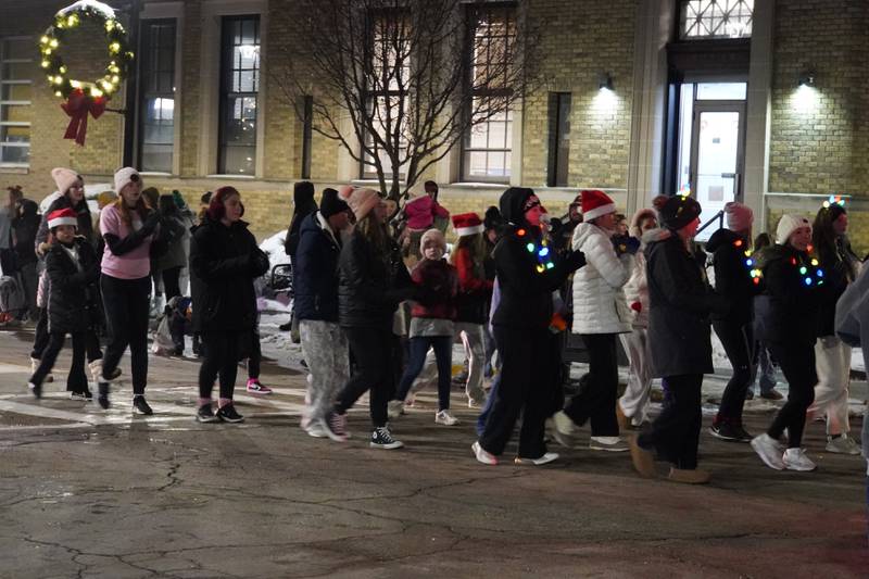 Dancers put on a show in Rochelle's lighted Christmas parade on Friday, Dec. 5, 2025.