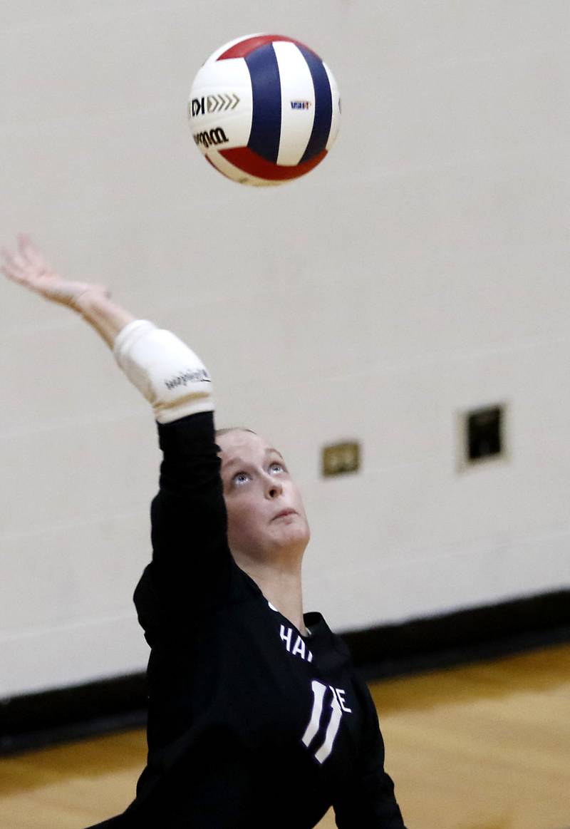 Hampshire's Jorah Rutter serves the ball during an IHSA Class 4A MacHenry Sectional volleyball match against Libertyville on Tuesday, Nov. 5, 2024, at McHenry High School Freshman Campus.
