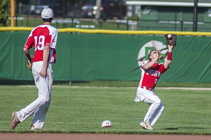 Oregon’s Issac Reber hauls in a pop-up Monday, May 16, 2022 against Rock Falls in the IHSA baseball quarterfinals.