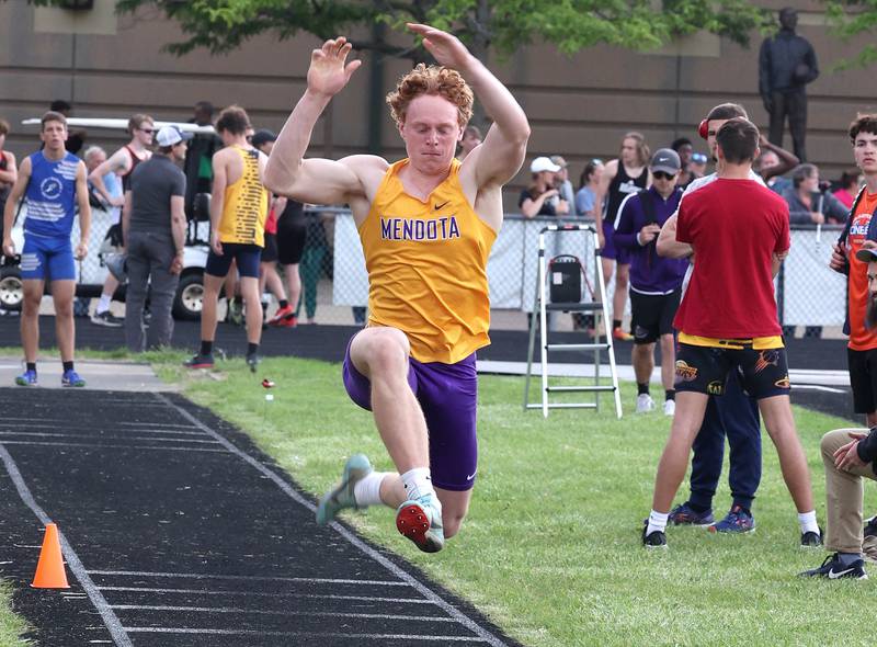 Mendota’s Mason Koch participates in the triple jump Thursday, May 16, 2024, during the Class 2A boys track sectional at Sycamore High School.