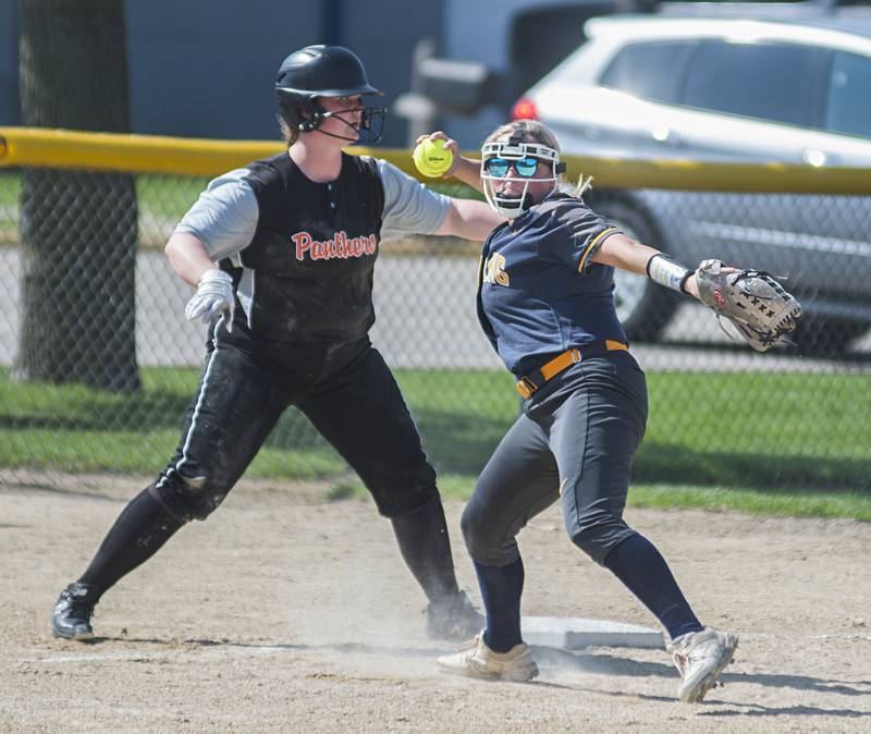 Sterling's Ellie Leigh fires to first after tagging out a runner for an inning ending double play Monday, April 9, 2022 against United Township.