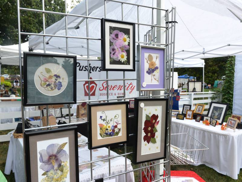 The "Petal Pushers", a fundraising group for Serenity Hospice and Home, had items for sale at the 74th Grand Detour Arts Festival held on Sunday, Sept. 10, 2023 at the John Deere Historic Site in Grand Detour.