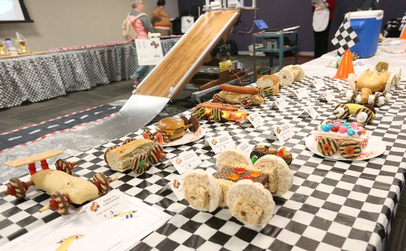 Cars made entirely from food are on display before racing during the 18th annual Editable Car Contest on Wednesday, Feb. 28, 2024 at Illinois Valley Community College in Oglesby.