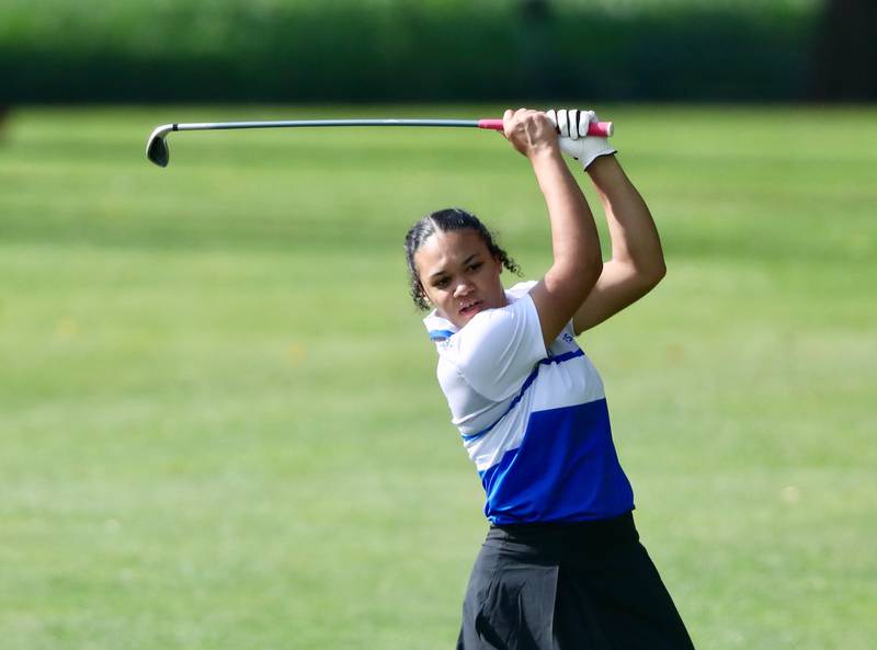 Princeton's Emma Kruse-Carter watches her iron shot during Thursday's meet at Wyaton Hills.