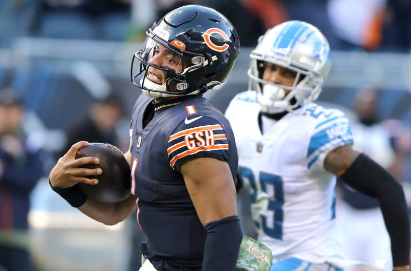 Chicago Bears quarterback Justin Fields outruns the Lions defense for a long touchdown  in the fourth quarter of their game Sunday, Nov. 13, 2022, at Soldier Field in Chicago.