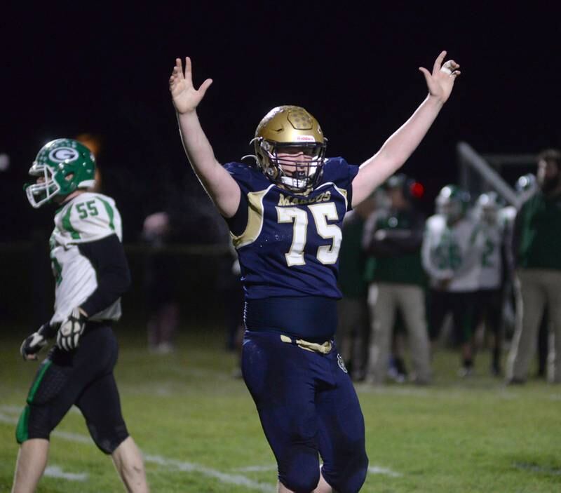 Polo's Wyatt Plachno (75) celebrates a Marco touchdown against Alden-Hebron during 8-man playoff action on Friday, Nov. 1, 2024 in Polo.