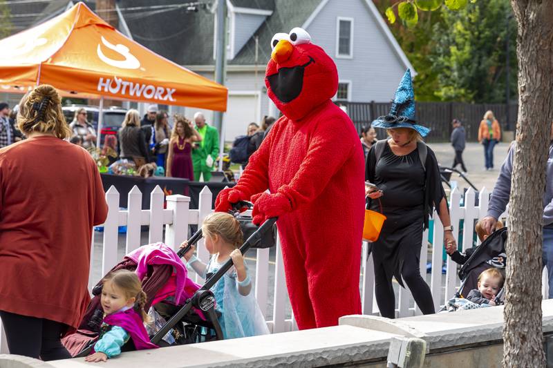 A large Elmo was spotted with his children at the Plainfield Spooktacular Trick-or-treating event Saturday Oct 25, 2025 in Plainfield.