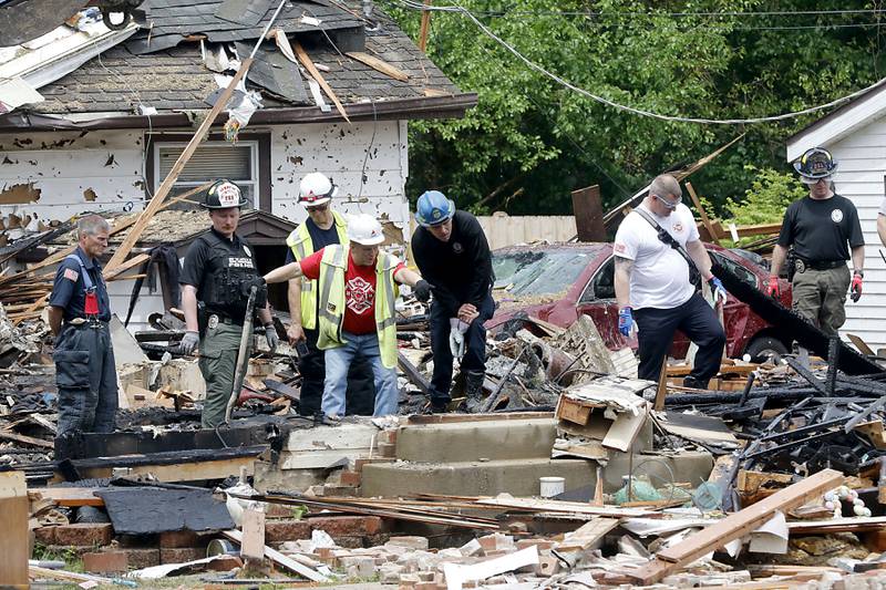 Authorities look for the cause of a home explosion on Monday, May 18, 2026, in 7400 block of Birch Drive, in Wonder Lake, after the Sunday evening explosion. One resident of a home was killed and two others have been taken to the hospital.