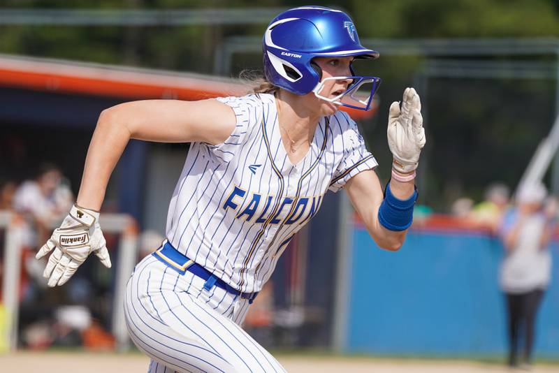 Wheaton North's Makayla Hammer (11) runs out a single against Oswego during a Class 4A Oswego Sectional Final game at Oswego High School on Friday, June 6, 2025.