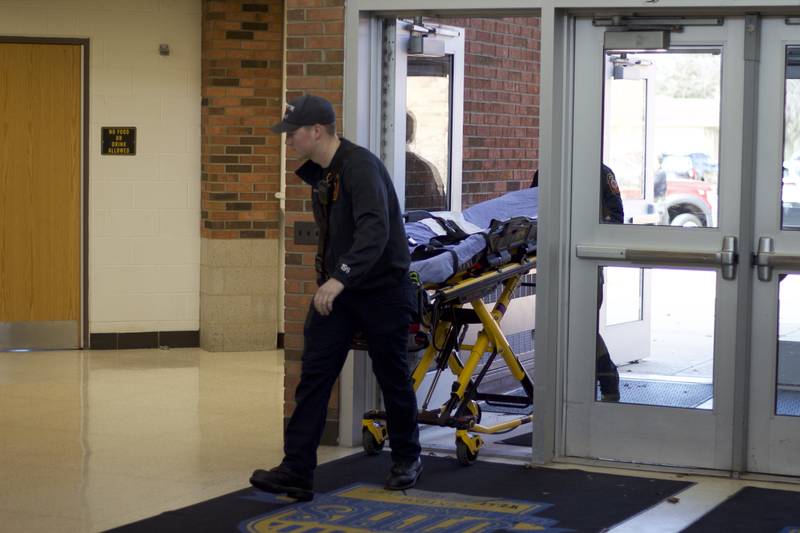 Paramedics entering Joliet West High School on Tuesday, March 25, 2025, for a staged emergency drill simulating the aftermath of a gas explosion.
