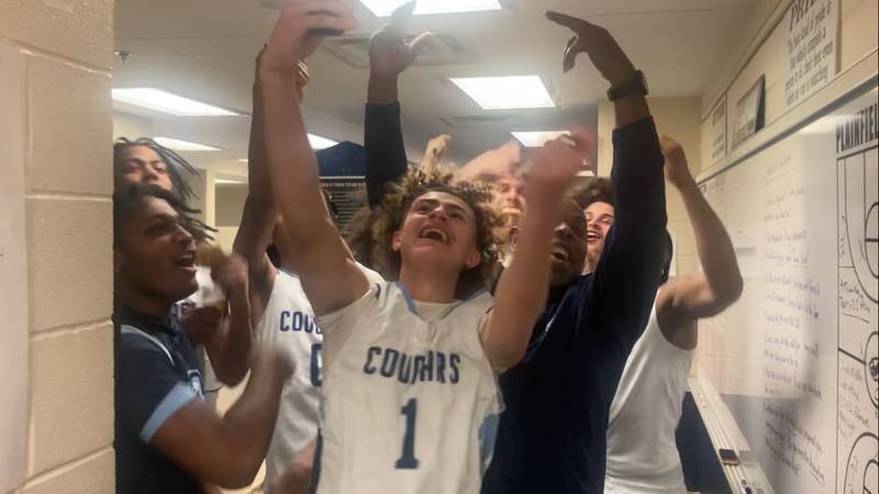 The Plainfield South basketball team celebrates after their win over Minooka.