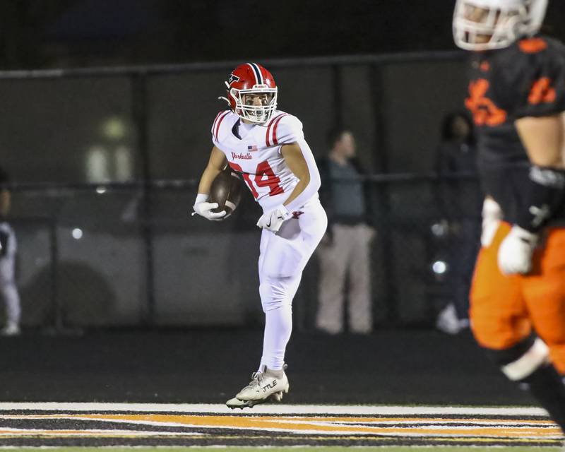 Yorkville's Gavin Geegan (34) celebrates his touchdown run during football game between Yorkville at Plainfield East Friday, Sept 19, 2025 in Plainfield.