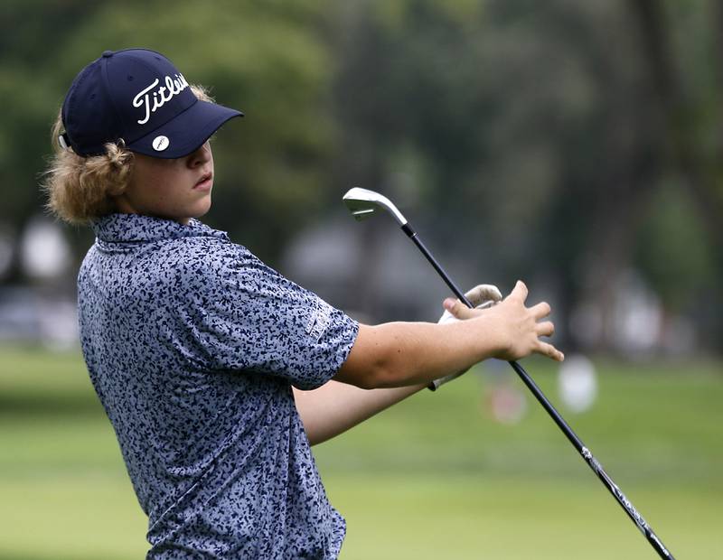 Cary-Grove’s Brock Iverson reacts to his tee shot on the fourth hole during the Fox Valley Conference Boys Golf Tournament Thursday, Sept. 21, 2023, at McHenry Country Club in McHenry.