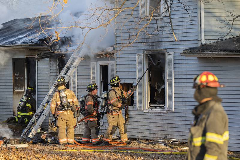 Firefighters work the scene of a fire Sunday, Jan. 19, 2025, at 550 Mill Street in Emerson.
