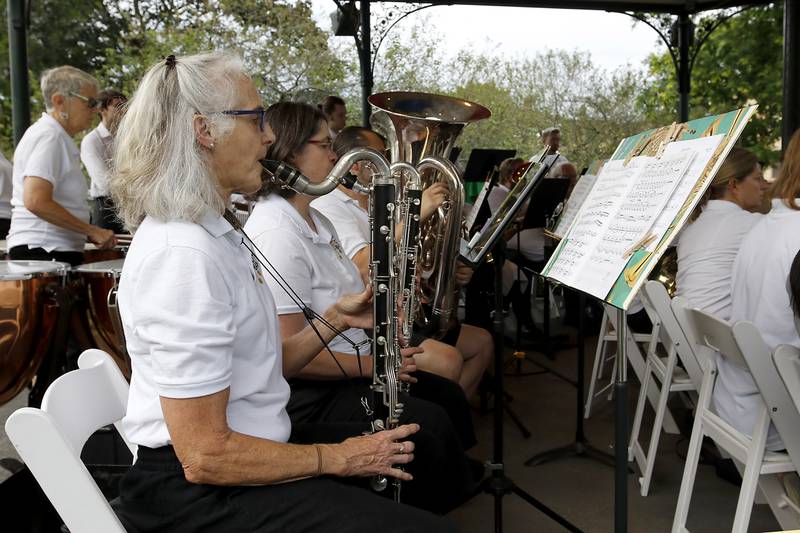 Suzy Martin, and other members of the Woodstock City Band, perform Wednesday, July 24, 2024, in the historic Woodstock Square. The band that is in its 140th season, performed their Galloping through the Gallery concert for the crowd.