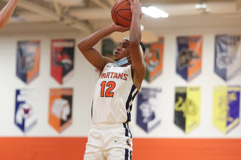 Romeoville's Troy Cicero Jr. puts up a shot against Brother Rice. Saturday, Jan. 15, 2022 in Romeoville.
