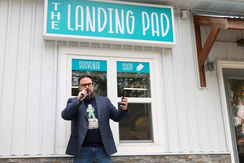 Greg Peerbolte, chief executive officer of the Joliet Area Historical Museum, speaks during The Landing Pad Souvenir Shop's grand opening at Wilmington's South Island Park on Thursday, May 22, 2025.