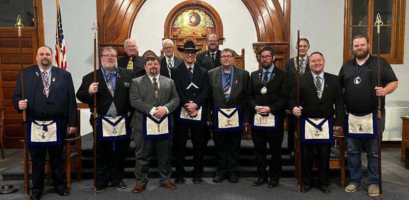 (Front, from left) Eric T. Mrowicki, Senior Steward; Jeffrey L. Glade, Senior Deacon; Raymond W. Miller, Sr., Junior Warden; Steven J. Brown, Worshipful Master; Eric M. Lynch, Senior Warden; Alexander J. Zarka, Chaplain; Scott E. Heyob, Junior Deacon; Jacob Erickson, Junior Stewart. Back: Larry E. Lawson, Secretary; Gary E. Olson, Tyler; Lucas E. Matson, Treasurer; Richard Spahn, Installing Officer and Area Deputy Grand Master for the Northern Area. Missing was Richard Brown, Marshal.