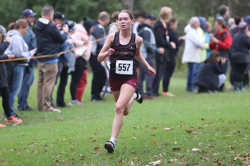 Plainfield North’s Tessa Russo takes sixth in the Southwest Prairie Conference meet at Channahon Park in Channahon on Friday, Oct. 13, 2023.