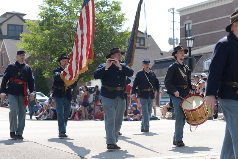 Members of  the 104th Illinois Volunteer Infantry (La Salle County) participate in the Hinsdale 4th of July parade Tuesday June 4, 2023.