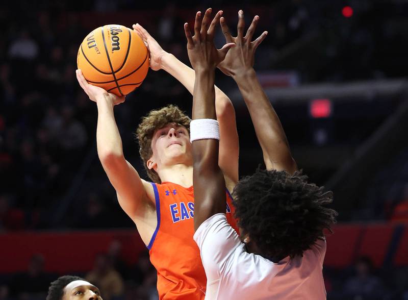 Eastland's Tanner Stern shoots over Chicago Hope Academy's Jaiden Simmons during their IHSA Class 1A state championship game Saturday, March 15, 2025, in the State Farm Center at the University of Illinois in Champaign.