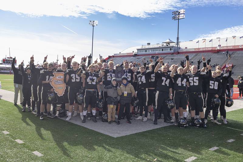 Lena-Winslow celebrates their 58-13 victory over Brown County Friday, Nov. 28, 2025, in the Class 1A football finals at Hancock Stadium at ISU.