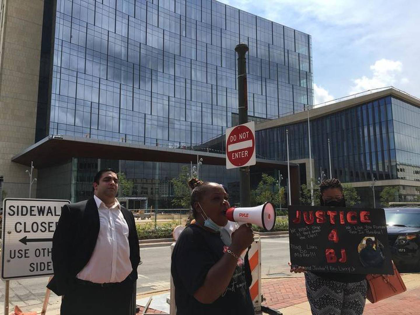 Protesters hold rally against Will County State's Attorney James Glasgow in response to the death of Eric Lurry on Monday, Aug. 10, 2020, in downtown Joliet.