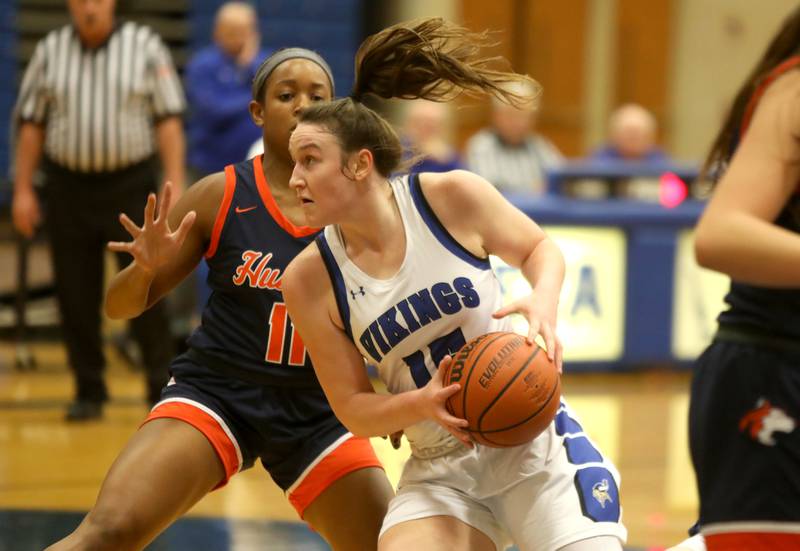 Geneva’s Cassidy Arni (15) drives toward the basket during a home game against Naperville North on Tuesday, Nov. 29, 2022.