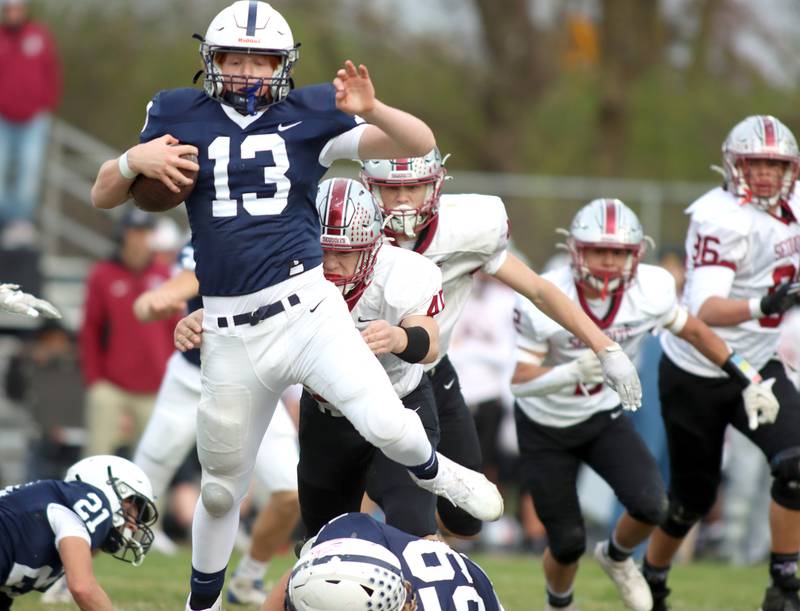 Cary-Grove’s Jackson Berndt scrambles for a first down against Antioch in IHSA Class 6A second-round playoff football action on Saturday, Nov. 9, 2024, at Al Bohrer Field on the campus of Cary-Grove High School in Cary..