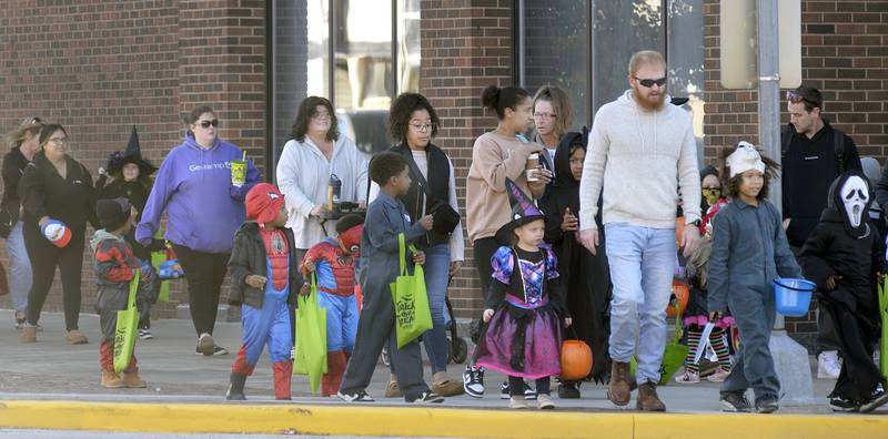 Crowds of children and adults scattered Saturday, Oct. 26, 2024, throughout Streator during the annual downtown trick or treat.