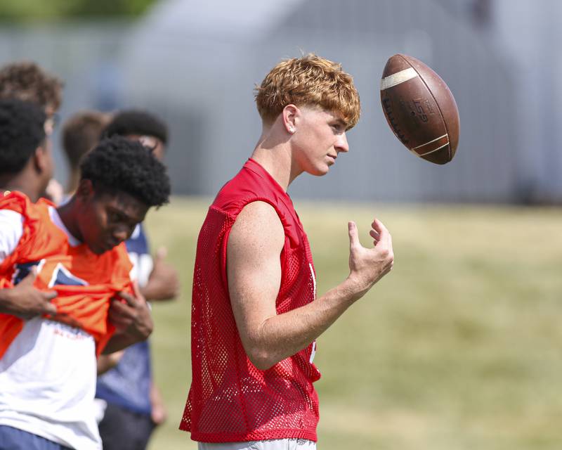 Dillon Griffin waits his turn during offensive drills at Oswego High School Football Practice, Monday, Aug 11, 2025  in Oswego.