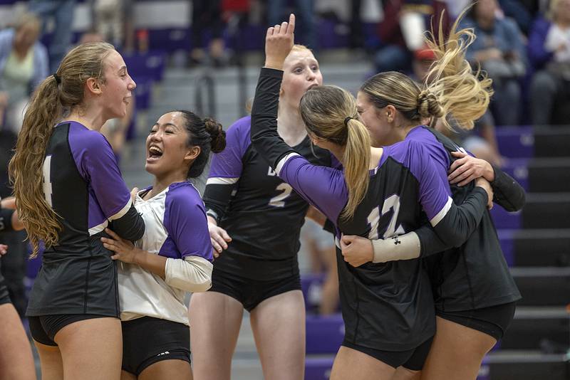Dixon volleyball celebrates their two-set win over top-seeded L-P Tuesday, Oct. 29, 2024, at the class 3A regional semifinal in Dixon.