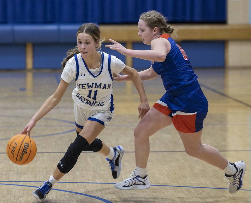 Newman’s Brooklyn Smith works against Eastland’s Izzy Ames Tuesday, Jan. 7, 2025, at Newman High School.
