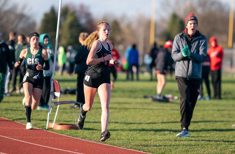 Yorkville’s Ava Galloway competes in the 3200-meter race during the Matt Wulf Invitational track and field meet at Yorkville High School on Thursday, April 14, 2022.