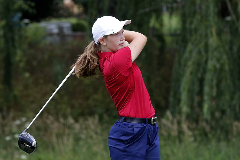 Lennix Hafner watches her tee shot on the sixth hole during the final round of McHenry County Junior Amateur Golf Tournament  on Tuesday, July 18, 2025, at Foxford Hills Golf Club in Cary.
