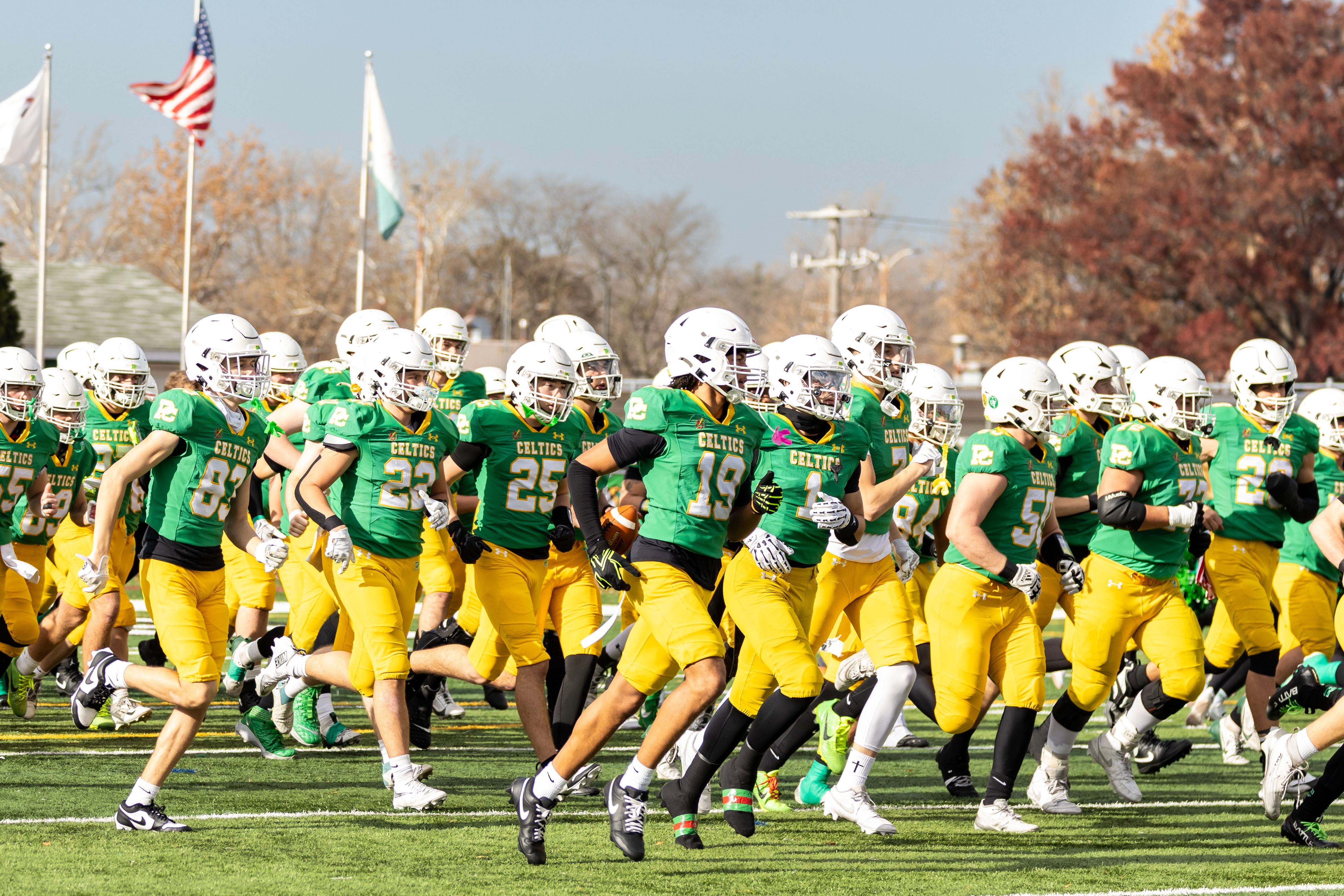 Providence’s players take the field prior to a 5A varsity football playoff game against Washington at Providence on Nov. 15, 2025.