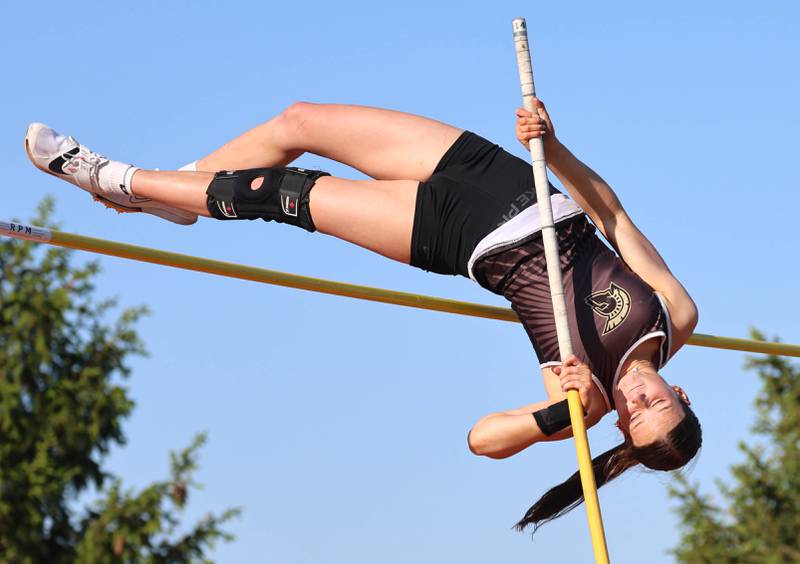 Sycamore’s Sydney Fabrizius clears the bar in the pole vault Friday, May 15, 2026, during the Class 2A girls track sectional at Genoa-Kingston High School.
