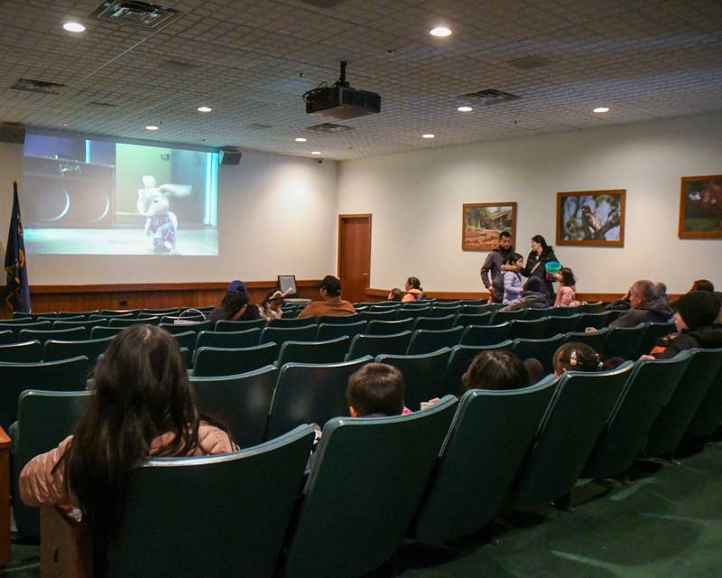 Attendees who visited Cantigny Park in Wheaton enjoy viewing the movie Hope during the Easter Egg Hunt event on Sunday March 24, 2024.