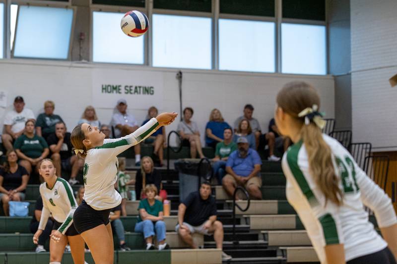 Lila Koehler (12) of St. Bede returns ball over net on Thursday, Sept. 11, 2025 at Abbot Vincent Gymnasium in Peru.
