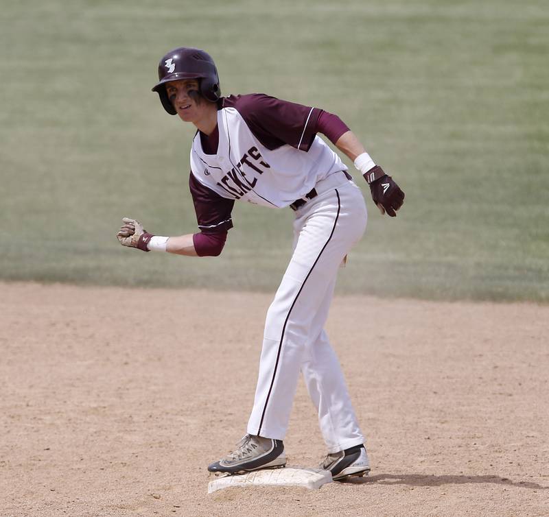 Richmond-Burton’s Jason Miller celebrates a double during a IHSA Class 2A supersectional baseball game between Richmond-Burton and Timothy Christian at the Rockford Rivets Stadium in Rockford.