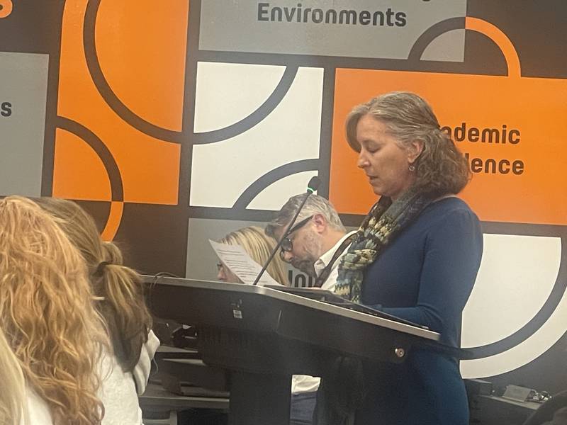 Founders Elementary School teacher Denise Oesterlin addresses the DeKalb School District 428 Board Nov. 18, 2025, with her concerns over the district's plans for reconfiguring grade-level centers.