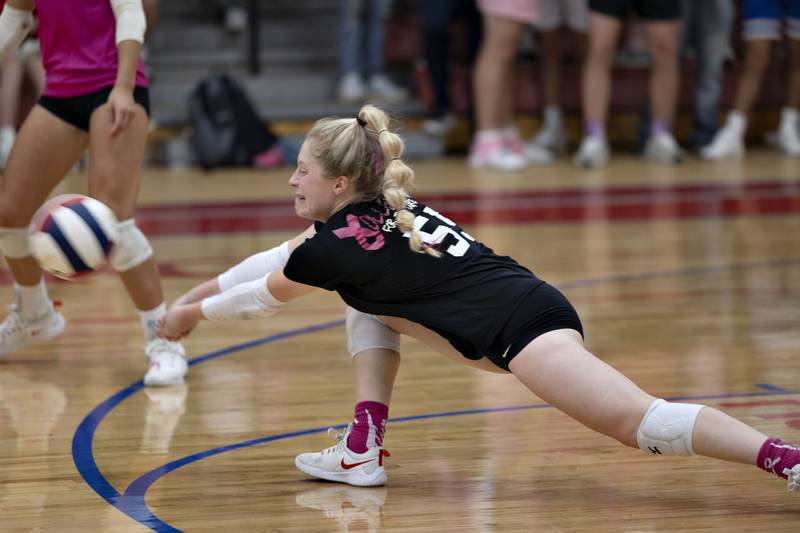 Oregon’s Sophie Stender digs the ball Tuesday, Oct. 11, 2022 against Rock Falls.