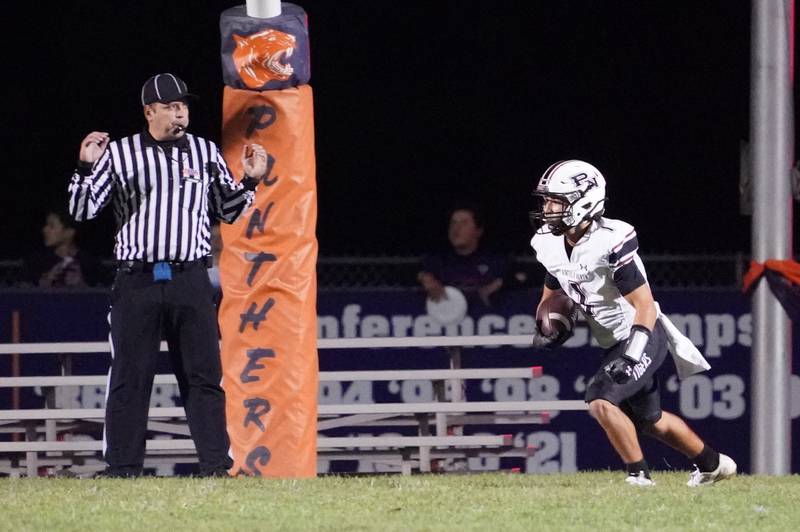 Plainfield North's Omar Coleman (1) scores a touchdown against Oswego during a football game at Oswego High School on Friday, Sept. 27, 2024.
