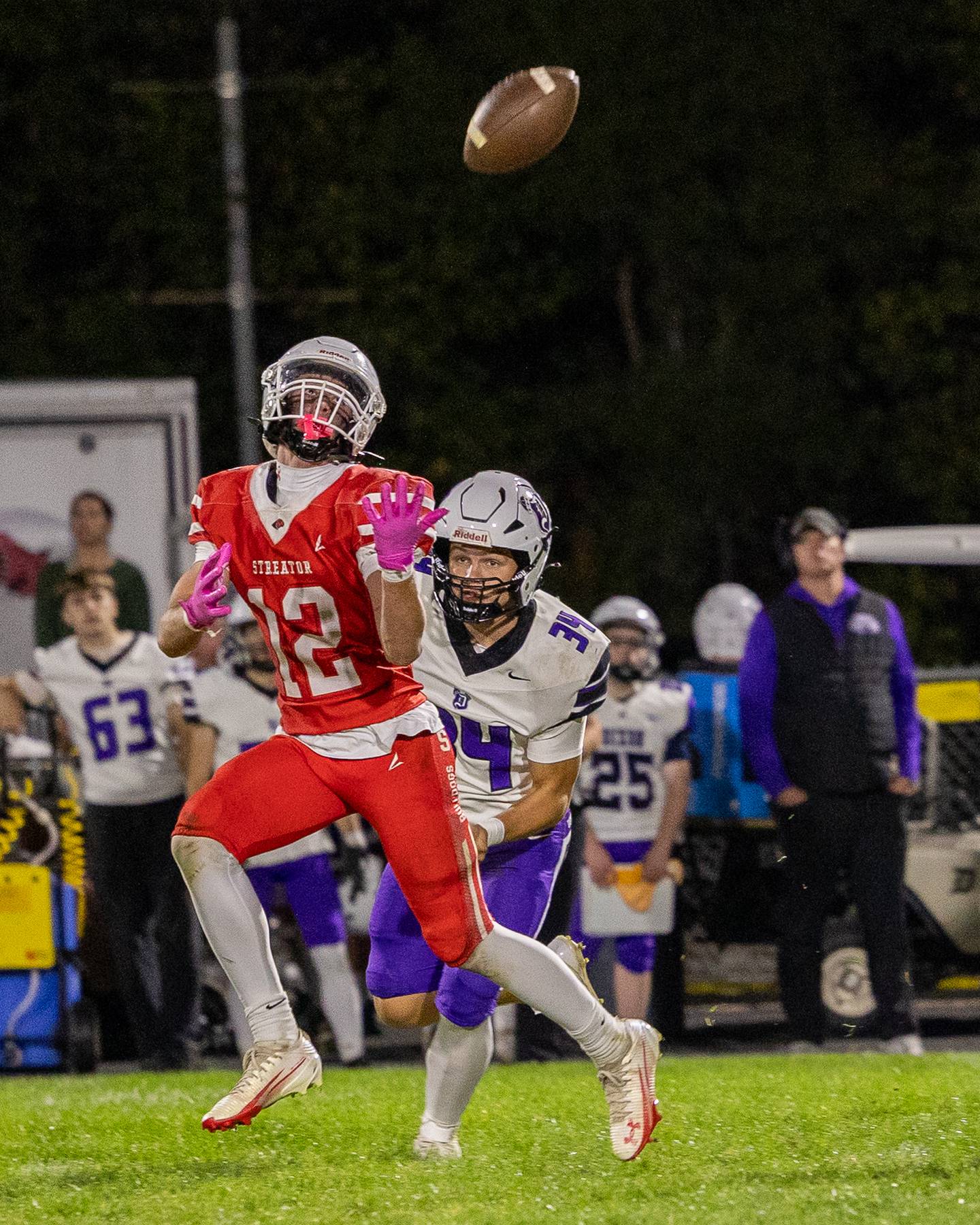 Riley Stevens (12) of Streator looks to catch pass on Friday, October 17, 2025 at Streator High School in Streator.