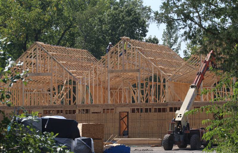 Workers build a new cabin units on Monday, Aug. 28, 2023 at Grand Bear Resort at Starved Rock in Utica.