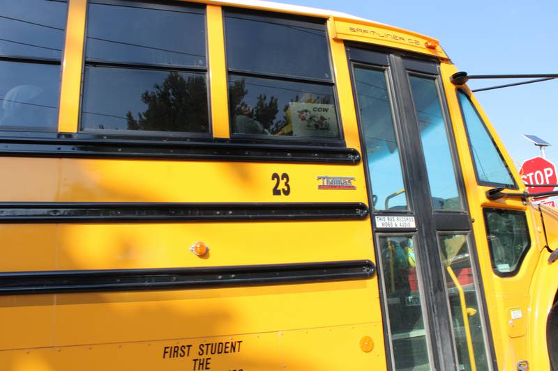 A First Student bus leaves Sterling Public Schools for afternoon runs on Sept. 30, 2021.