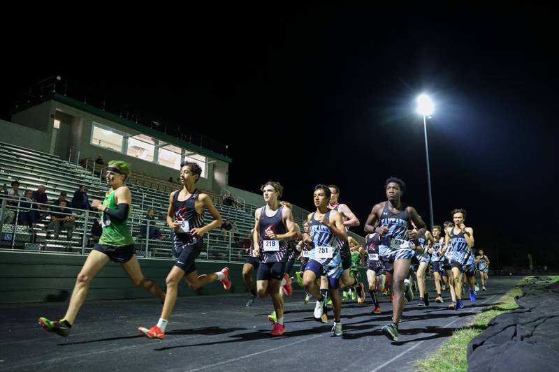 Runners from Bishop McNamara, Bradley-Bourbonnais and Kankakee begin the race during the All-City cross country meet at Bishop McNamara on Wednesday, Sept. 17, 2025.