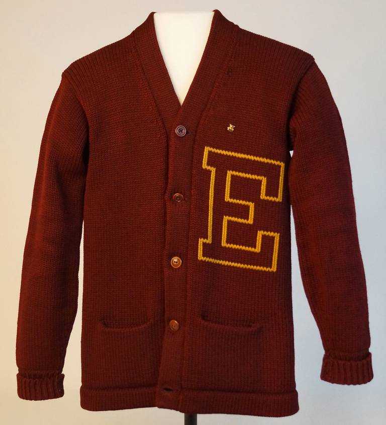 Eureka College letterman's sweater owned by Ronald Reagan, part of the Here I Have Lived: Home in Illinois exhibit at Abraham Lincoln Presidential Library and Museum.