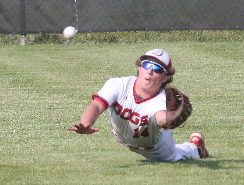 Streator right fielder Cole Martin dives for a fly ball against Peoria Richwoods during a Class 3A Metamora Sectional semifinal game on Wednesday, May 31, 2023.