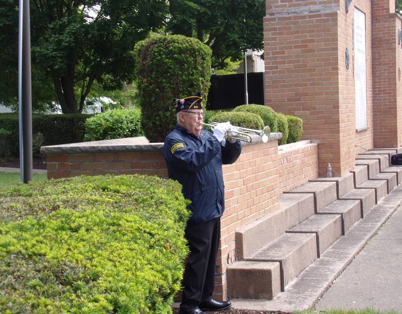 Tom Rice plays taps Monday, May 27, 2024, during the Memorial Day ceremony at Veterans Memorial Plaza at Streator's City Park.